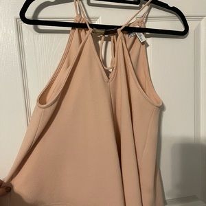 Slinky pink tank with adjustable ties